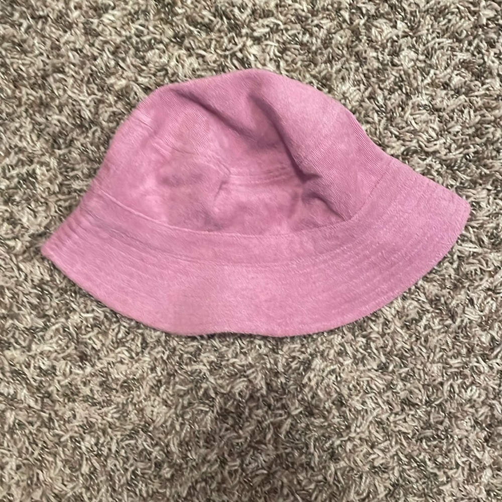 Purple bucket hat, nice for the pool towel material